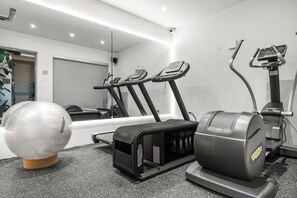 Stay fit on the go with our fully equipped gym featuring treadmills, an elliptical machine, and a stationary bike.