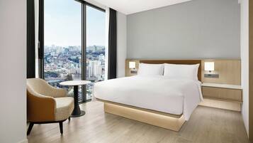 Suite, 1 King Bed, City View, Corner | Premium bedding, in-room safe, desk, soundproofing