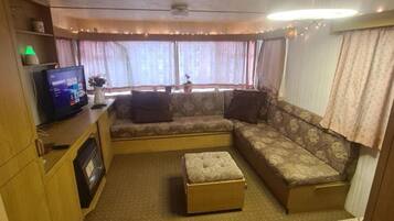 Cabin | Living area | TV, fireplace