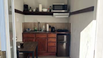 Microwave, coffee/tea maker, cookware/dishes/utensils, paper towels