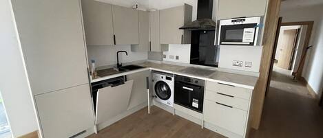 Appartement | Cuisine privée | Réfrigérateur, micro-ondes, four, plaque de cuisson