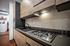 Apartment, City View | Private kitchen | Full-size fridge, microwave, oven, stovetop