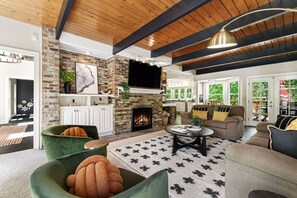 Smart TV, fireplace, video games, foosball