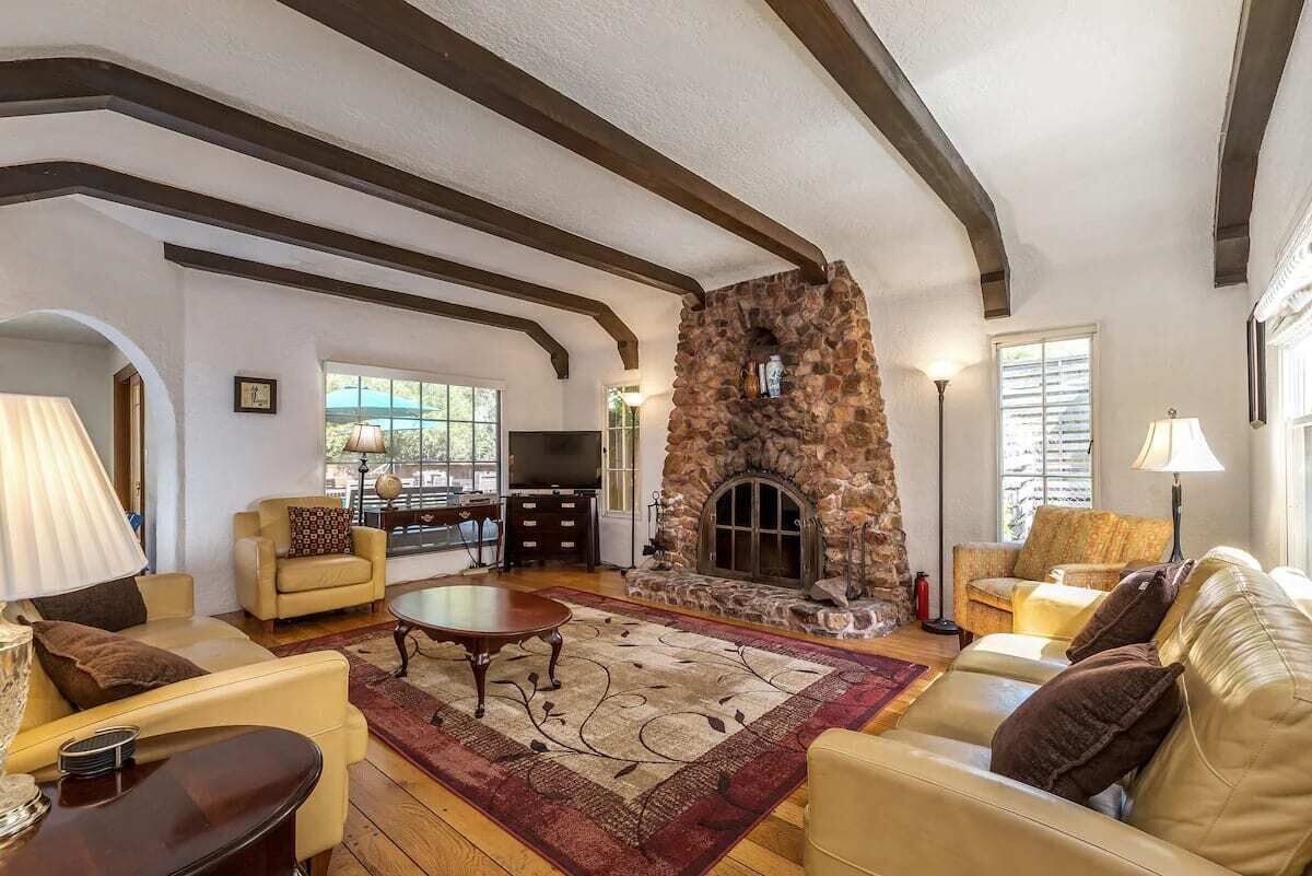 TV, fireplace, books, offices