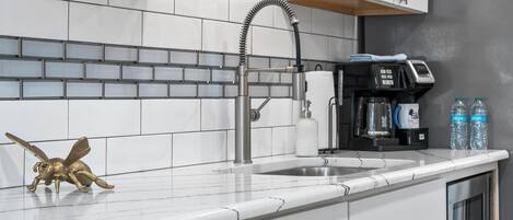 Fridge, microwave, coffee/tea maker, toaster