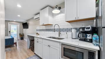 Fridge, microwave, coffee/tea maker, toaster