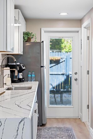 Fridge, microwave, coffee/tea maker, toaster