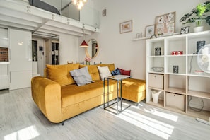 City Studio, 1 Double Bed with Sofa bed | Living area | 37-inch flat-screen TV with satellite channels - RentPlanet - Apartament Łokietka (Wroclaw)