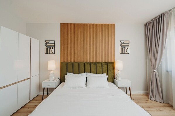 2 chambres, fer et planche à repasser, Wi-Fi, draps fournis