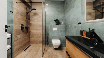 Sèche-cheveux, serviettes fournies, savon, papier toilette