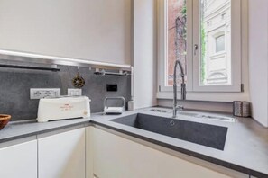 Hair dryer, bidet, towels, soap