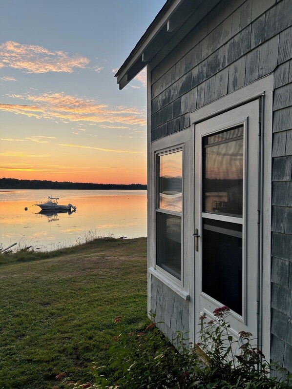 Property grounds - Delightful waterfront cottage with beautiful views of the sunset. (Cushing)