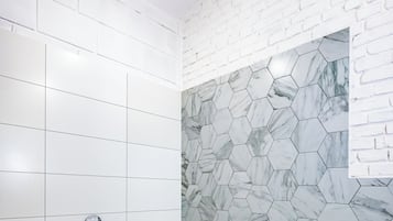 City Studio | Bathroom | Hair dryer, towels, soap, shampoo