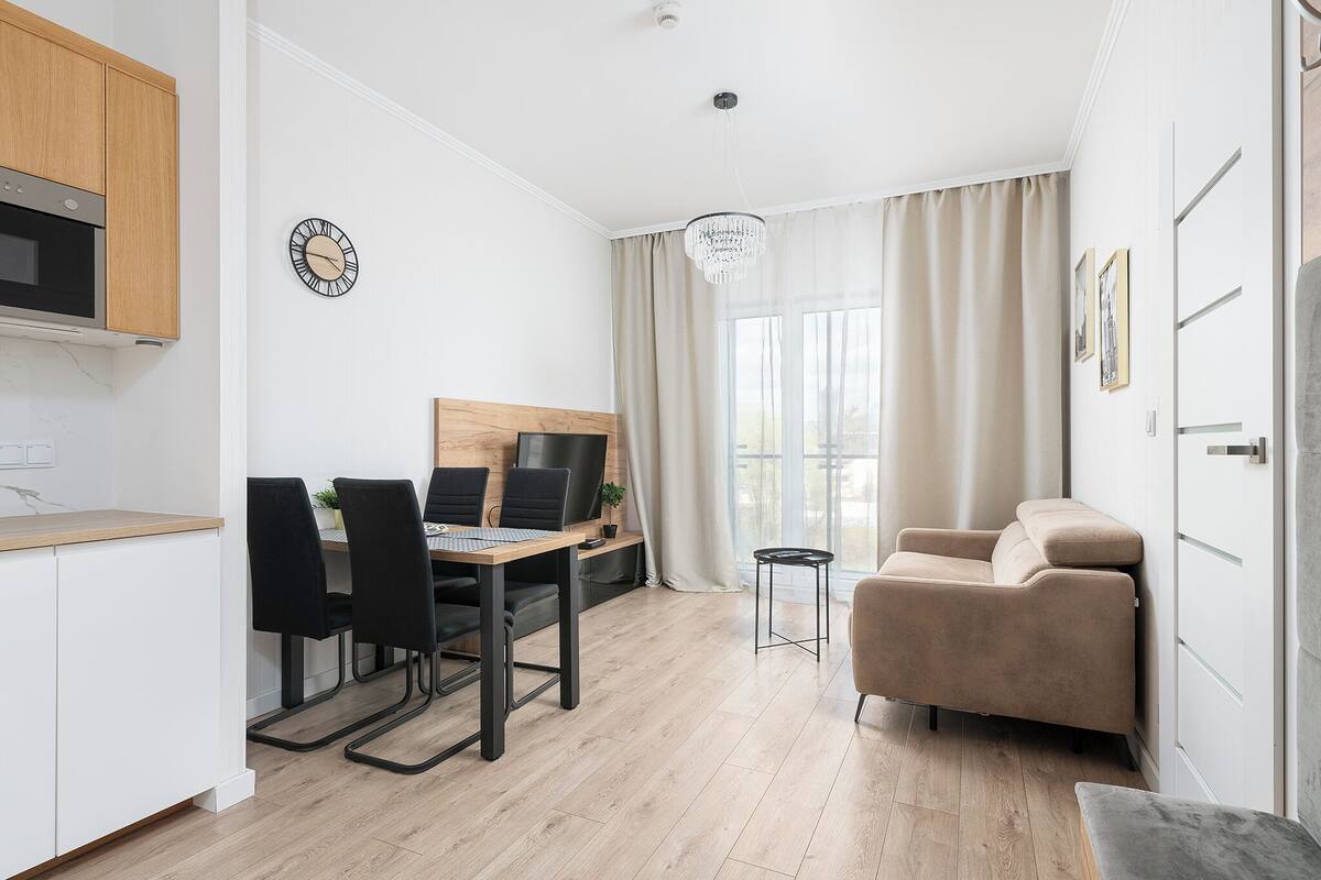 Comfort Apartment | Living area | 37-inch flat-screen TV with digital channels