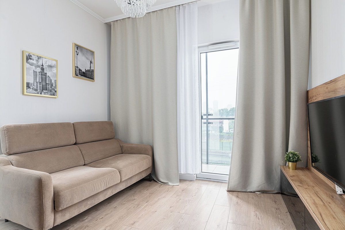 Comfort Apartment | Living room | 37-inch flat-screen TV with digital channels