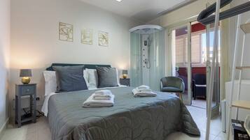 Economy Double or Twin Room, City View | Memory foam beds, in-room safe, desk, laptop workspace