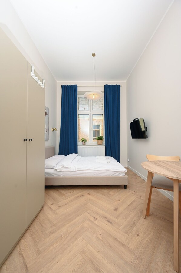 City-Studio | Bügeleisen/Bügelbrett, kostenloses WLAN, Bettwäsche