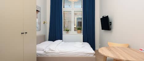 Studio Kota | Setrika/meja setrika, Wi-Fi gratis, dan seprai linen