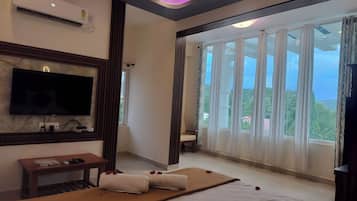 Luxury Room, Pool View | Desk, iron/ironing board, free WiFi, bed sheets