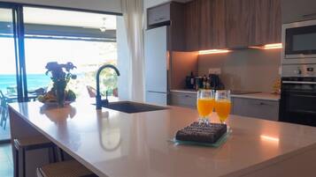 Family Apartment, 3 Bedrooms, Beach View | Private kitchen | Espresso maker, electric kettle, high chair, paper towels