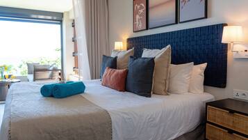 Family Apartment, 3 Bedrooms, Beach View | 3 bedrooms, in-room safe, individually decorated, individually furnished