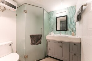 Shower, hair dryer, towels, soap