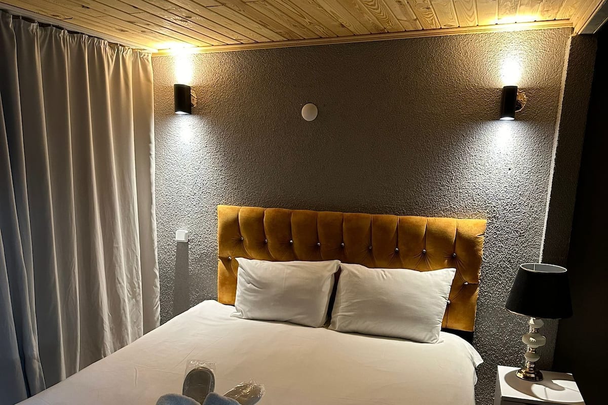 Roba de llit d'alta qualitat, minibar i escriptori
