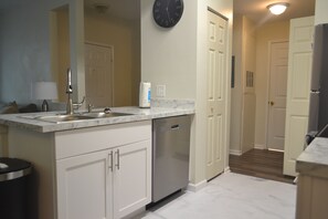 Condo, 1 King Bed, Kitchen, Ground Floor | Private kitchen | Full-sized fridge, microwave, oven, stovetop - Stylish Condo Near Clearwater's Beach (Clearwater)