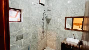 Shower, rainfall showerhead, towels, soap