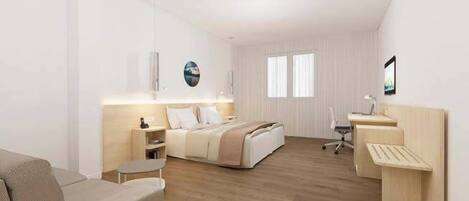 Une chambre d’hôtel moderne équipée d’un lit, d’un bureau, d’une chaise et d’une petite table.