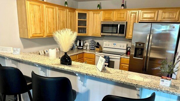 Private kitchen - Family-Friendly 3BR/3BA Gainesville Condo Near Downtown & Lake (Gainesville)