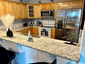 Fridge, microwave, oven, stovetop - Family-Friendly 3BR/3BA Gainesville Condo Near Downtown & Lake (Gainesville)