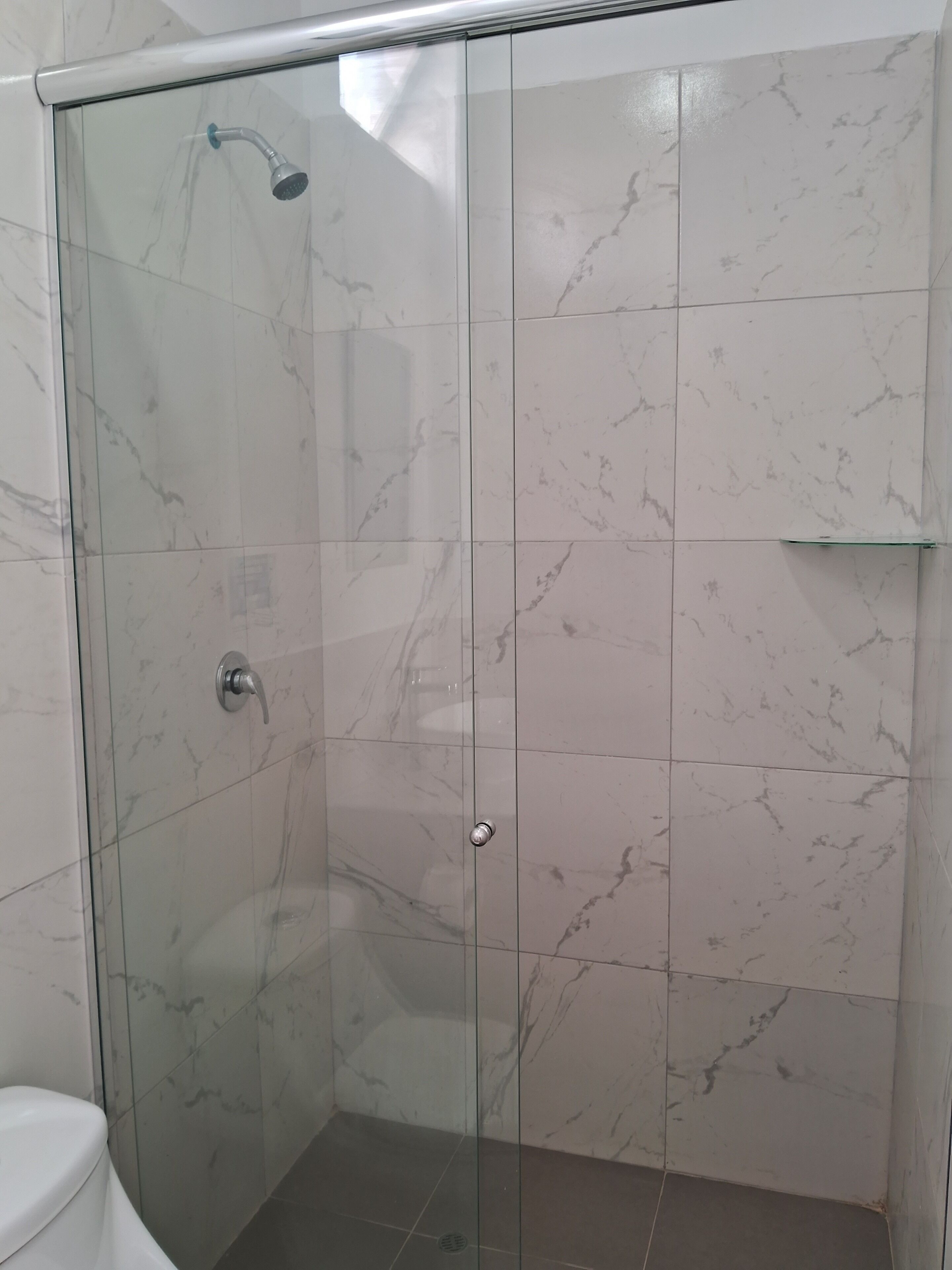Shower, towels, soap, shampoo