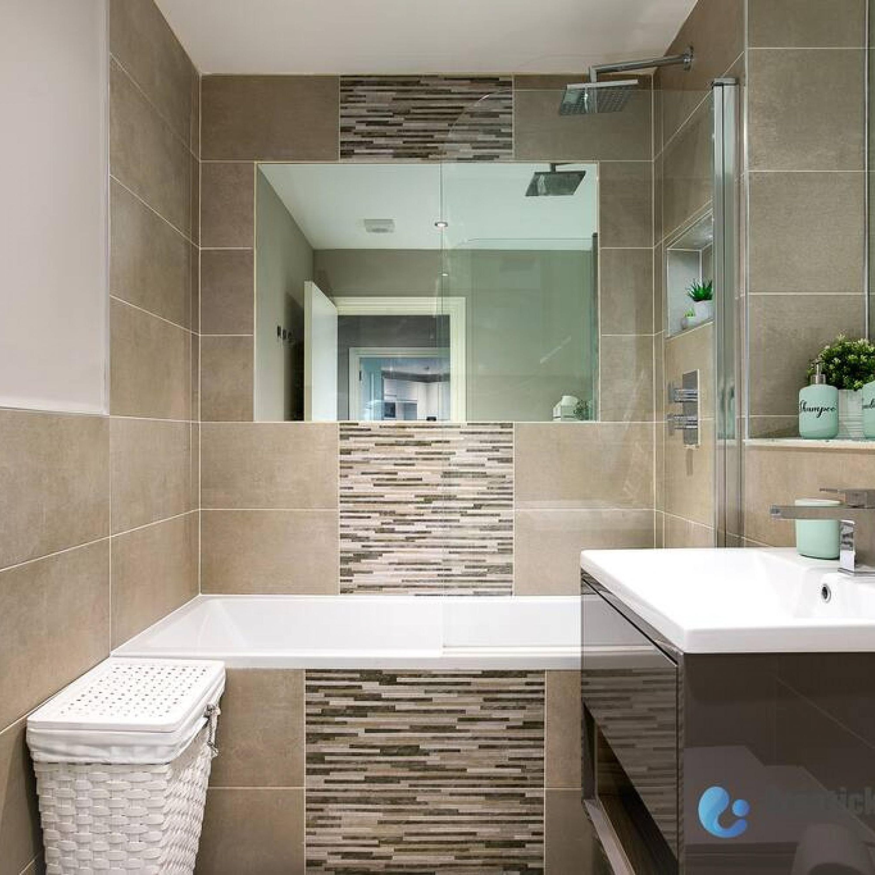 A modern bathroom with a large mirror, a bathtub, and a shower.