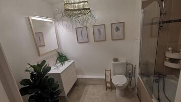 Hair dryer, bidet, towels, soap