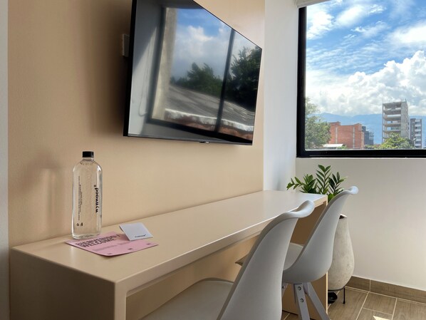 Apartment (205) | Living area | 40-inch Smart TV with cable channels
