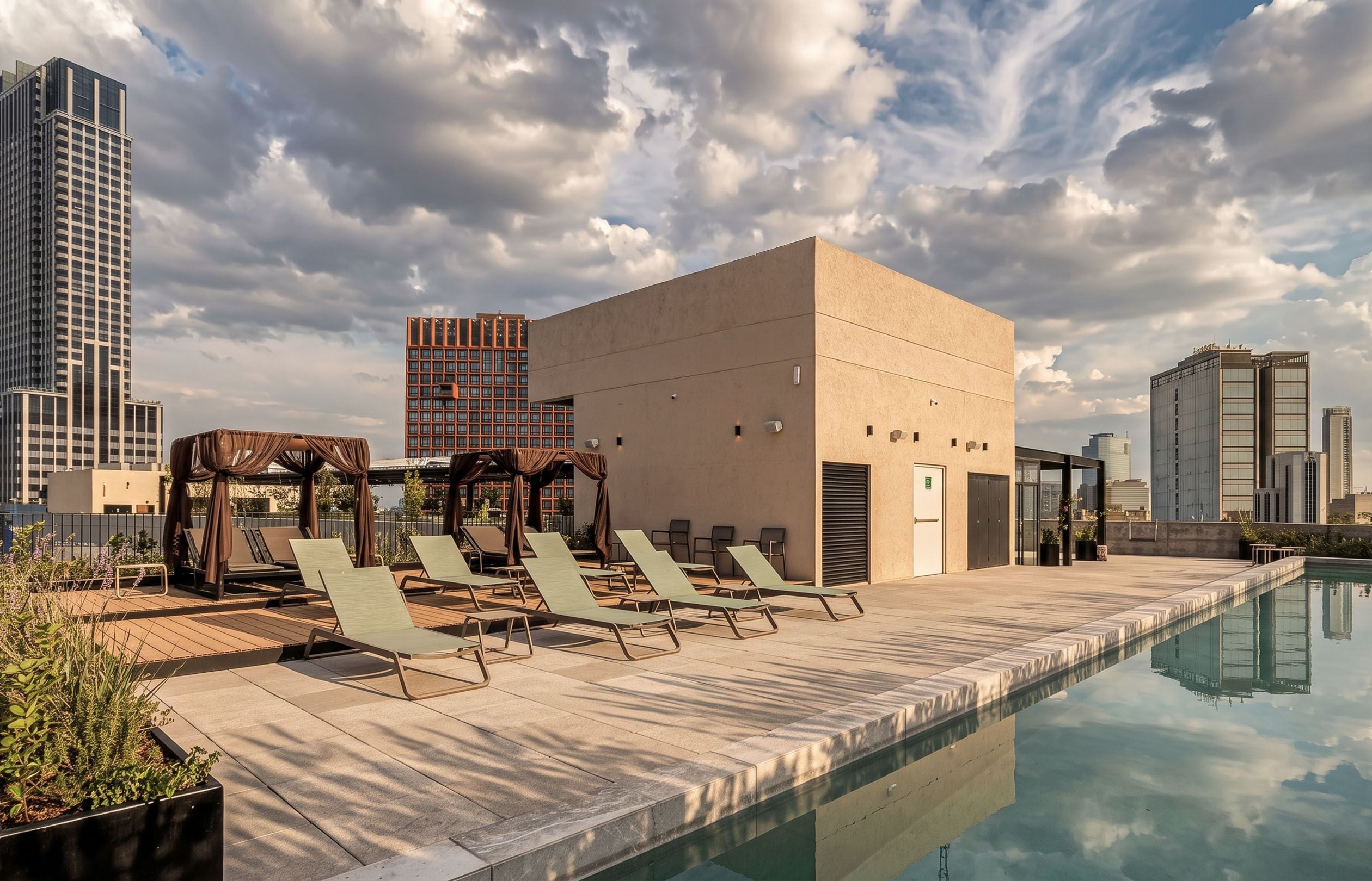 Outdoor pool, open 6:00 AM to 10:00 PM, pool umbrellas, pool loungers
