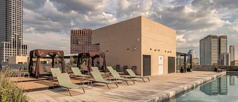 Outdoor pool, open 6:00 AM to 10:00 PM, pool umbrellas, sun loungers