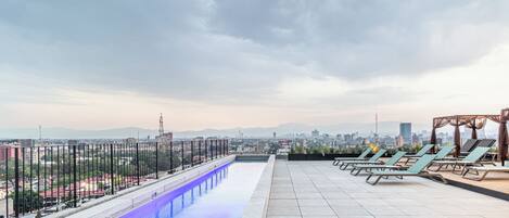 Outdoor pool, pool umbrellas, pool loungers