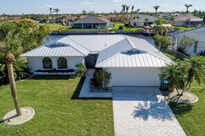 Exterior - Waterfront Villa: Canal, Dock, Dog Friendly, Heated Pool (Cape Coral)