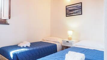 2 habitaciones, tabla de planchar con plancha, wifi y ropa de cama