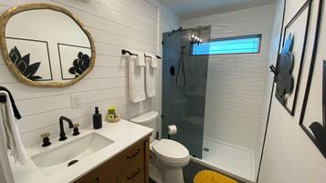 Shower, hair dryer, towels, soap