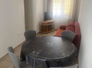 Apartment (Apartments Danijela & Vlado - Three B) | Living room | 32-inch flat-screen TV with satellite channels - Apartments Danijela & Vlado (Lopar)