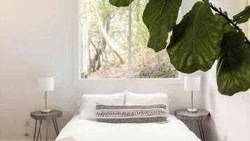 1 bedroom, desk, iron/ironing board, travel crib