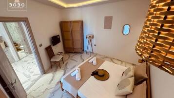 1 chambre, fer et planche Ă repasser, Wi-Fi gratuit, draps fournis