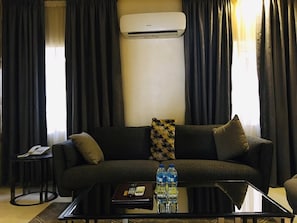 Premier Suite, Non Smoking, Private Bathroom | Living area | 43-inch Smart TV with cable channels