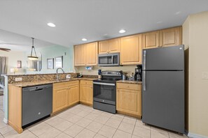 Fridge, microwave, oven, stovetop - Stay near John's Pass Villiage 2BR Condo on Beach (Treasure Island)