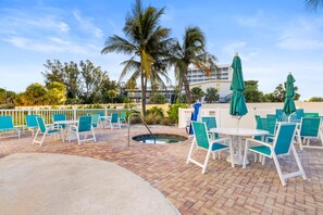 Outdoor dining - Vacation Bliss: 2BR Condo, Gulf View & Pool (Treasure Island)