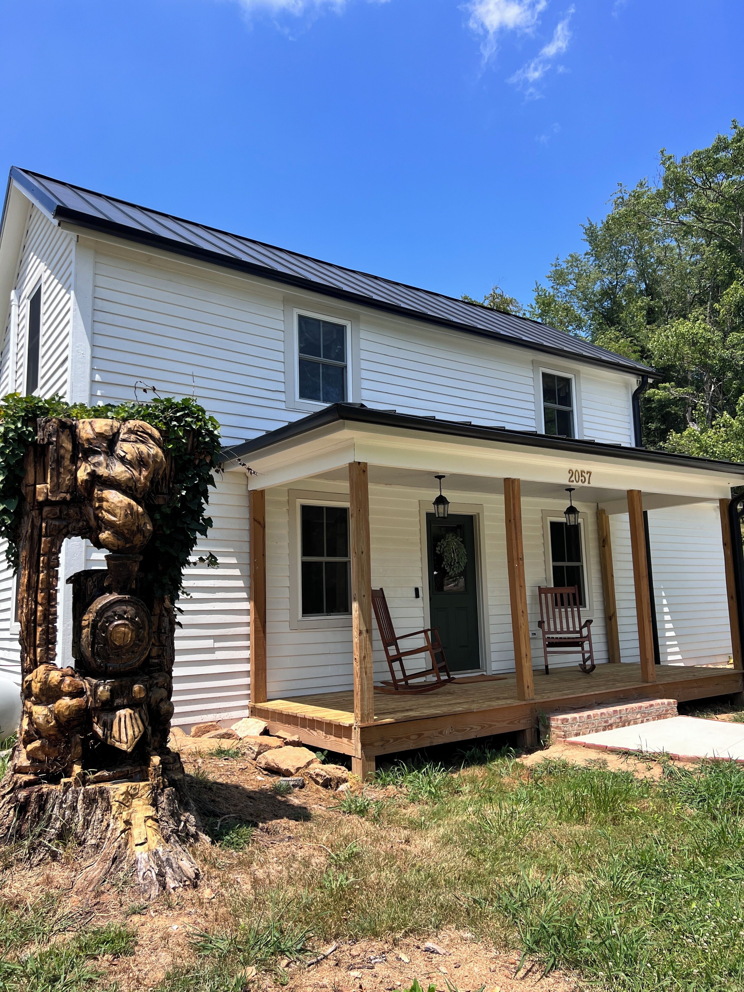 Restored 3-bedroom home from 1930 near Forest and Bedford with tree carving 