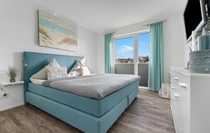 2 slaapkamers, een strijkplank/strijkijzer, reisbedje, gratis wifi